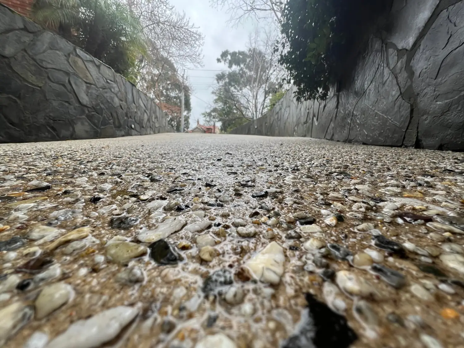 Pressure washing a Melbourne concrete driveway